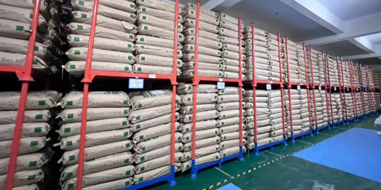 How do stacking racks achieve high-density storage?